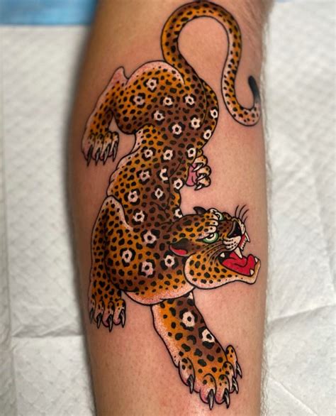 american traditional leopard tattoo.